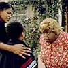 Nia Long and Martin Lawrence (in makeup as Big Momma) star in Big Momma's House 