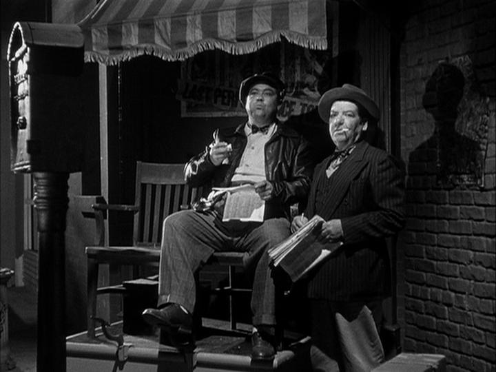 Nesdon Booth and Frank Mills in The Glass Wall (1953)