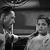 John Carradine and Acquanetta in Captive Wild Woman (1943)