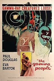 Paul Douglas and Eva Bartok in The Gamma People (1956)