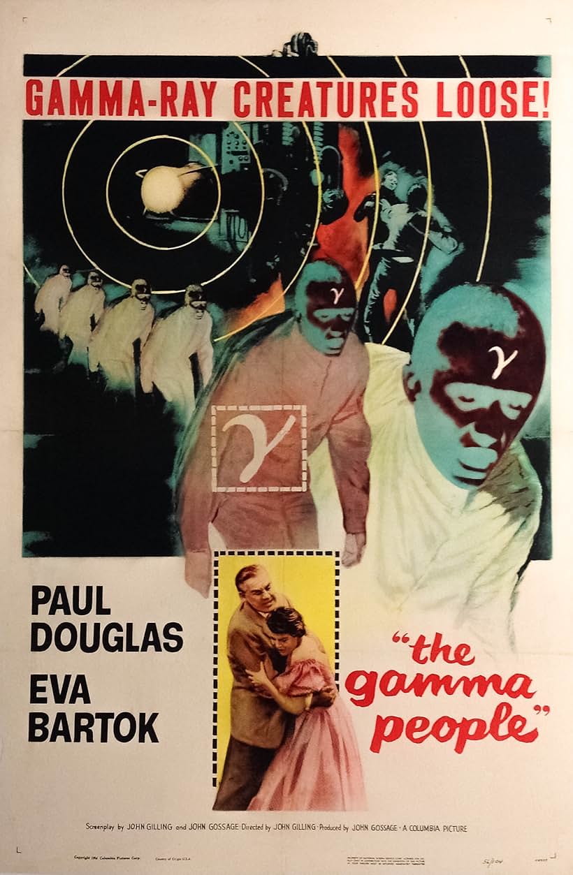 Paul Douglas and Eva Bartok in The Gamma People (1956)