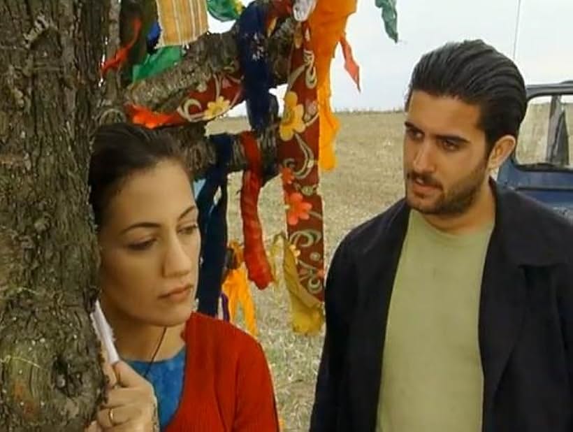 Memet Ali Alabora and Meltem Cumbul in Yilan Hikayesi (1999)