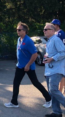 Actor/Director William Fichtner and Film Commissioner Tim Clark seen entering a Buffalo Bills game in Orchard Park, NY.