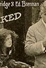 Edward Brennan and Betty Burbridge in Tricked (1915)