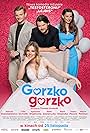 Mateusz Kosciukiewicz, Agnieszka Wiedlocha, Rafal Zawierucha, and Zofia Domalik in Gorzko, gorzko! (2022)