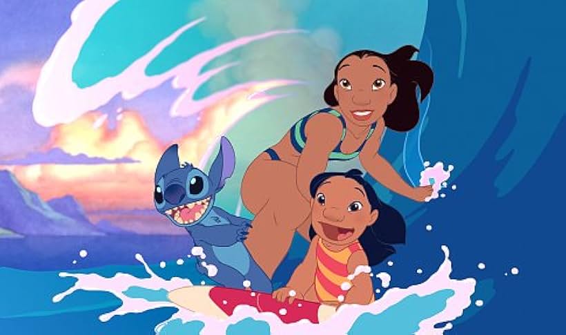 A young Hawaiian girl named Lilo (right), her sister Nani (middle), and their "dog" Stitch escape their troubles by catching a wave.