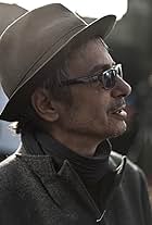 Leos Carax in Phân Thân (2012)