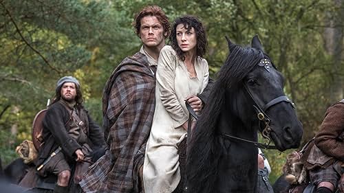 Caitríona Balfe, Sam Heughan, and Grant O'Rourke in Người Ngoại Tộc (2014)