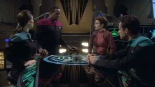 Terry Farrell, Nana Visitor, Avery Brooks, and Alexander Siddig in Star Trek: Deep Space Nine (1993)