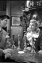 John McCallum and Googie Withers in It Always Rains on Sunday (1947)