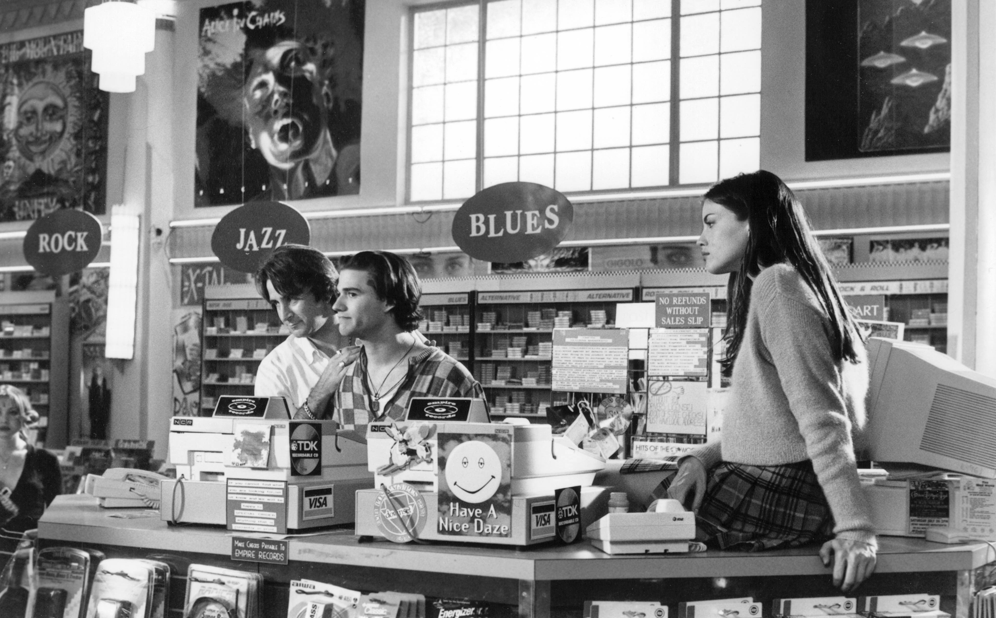 Liv Tyler, Anthony LaPaglia, and Johnny Whitworth in Empire Records (1995)