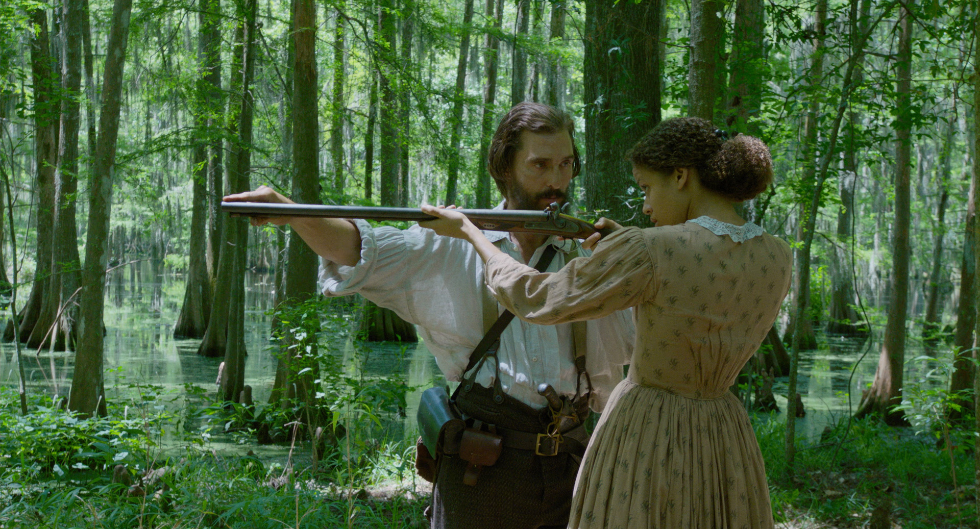 Matthew McConaughey and Gugu Mbatha-Raw in Free State of Jones (2016)