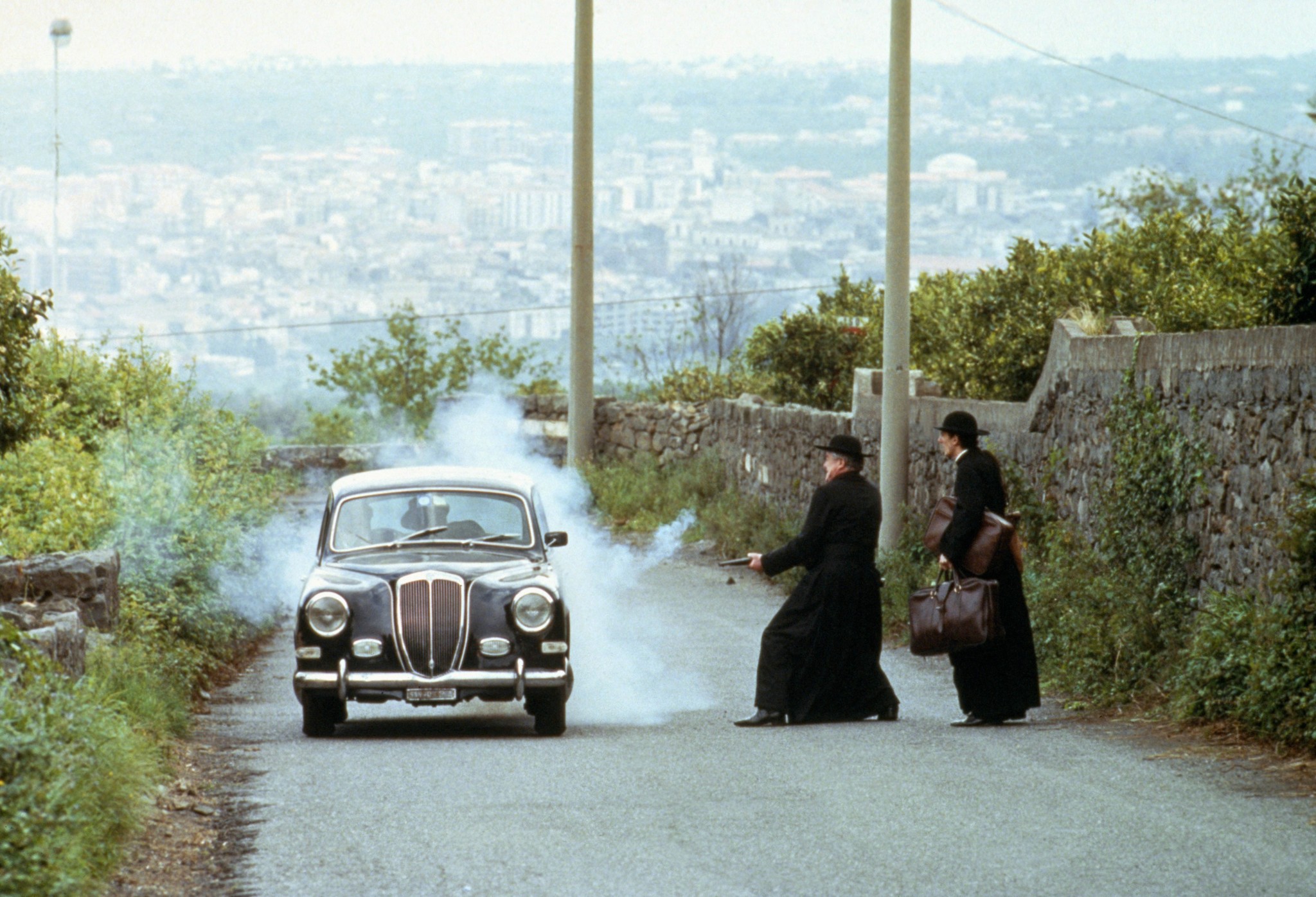 Mario Donatone, Vittorio Duse, and Michele Russo in Bố Già Phần III (1990)