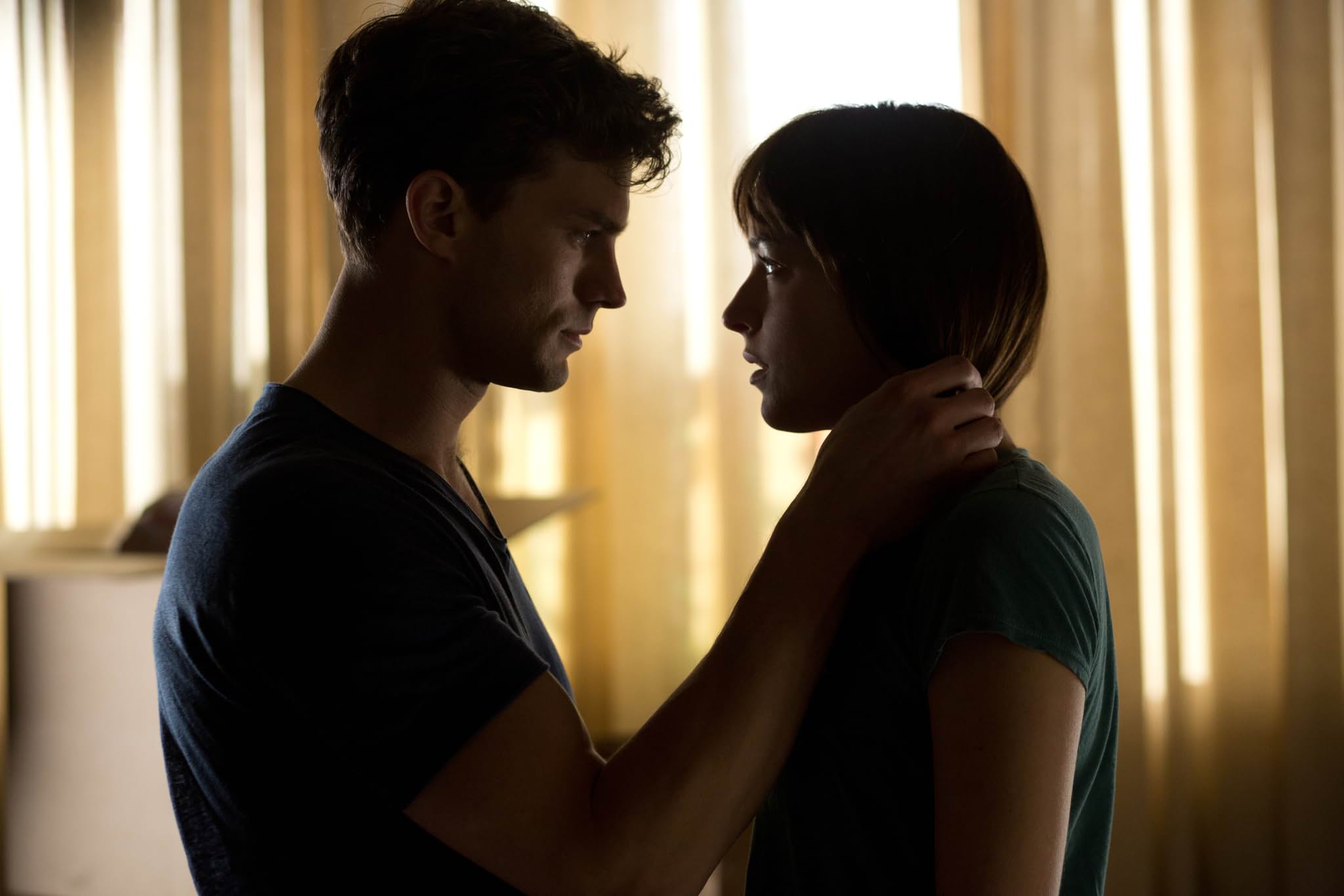 Dakota Johnson and Jamie Dornan in Năm Mươi Sắc Thái (2015)