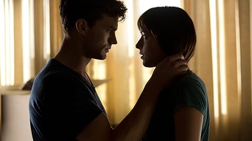 Dakota Johnson and Jamie Dornan in Năm Mươi Sắc Thái (2015)