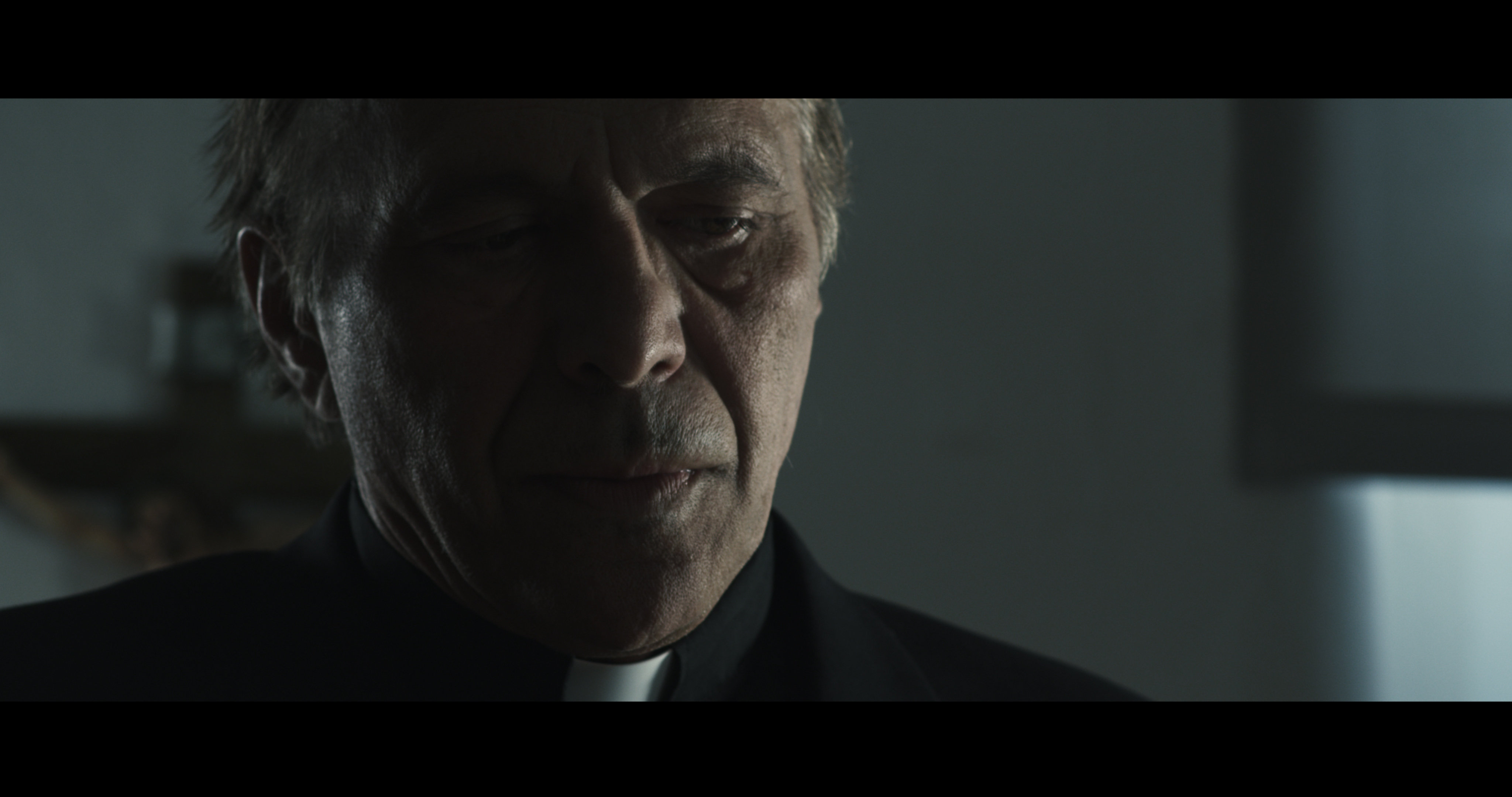 Nick Mancuso as FATHER DARIO in ENTITY.