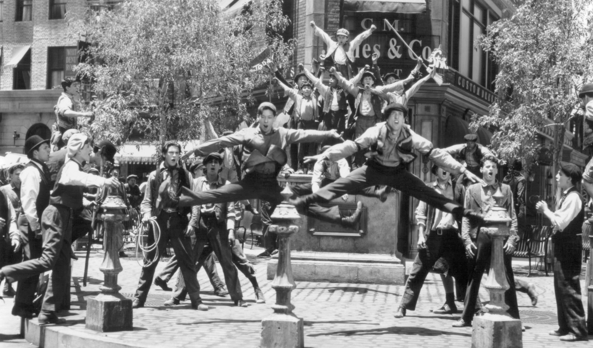 Christian Bale, Marty Belafsky, Max Casella, Luke Edwards, Michael A. Goorjian, Arvie Lowe Jr., Dominic Maldonado, David Moscow, Kevin Alexander Stea, and Matthew Schoenfeld in Newsies (1992)