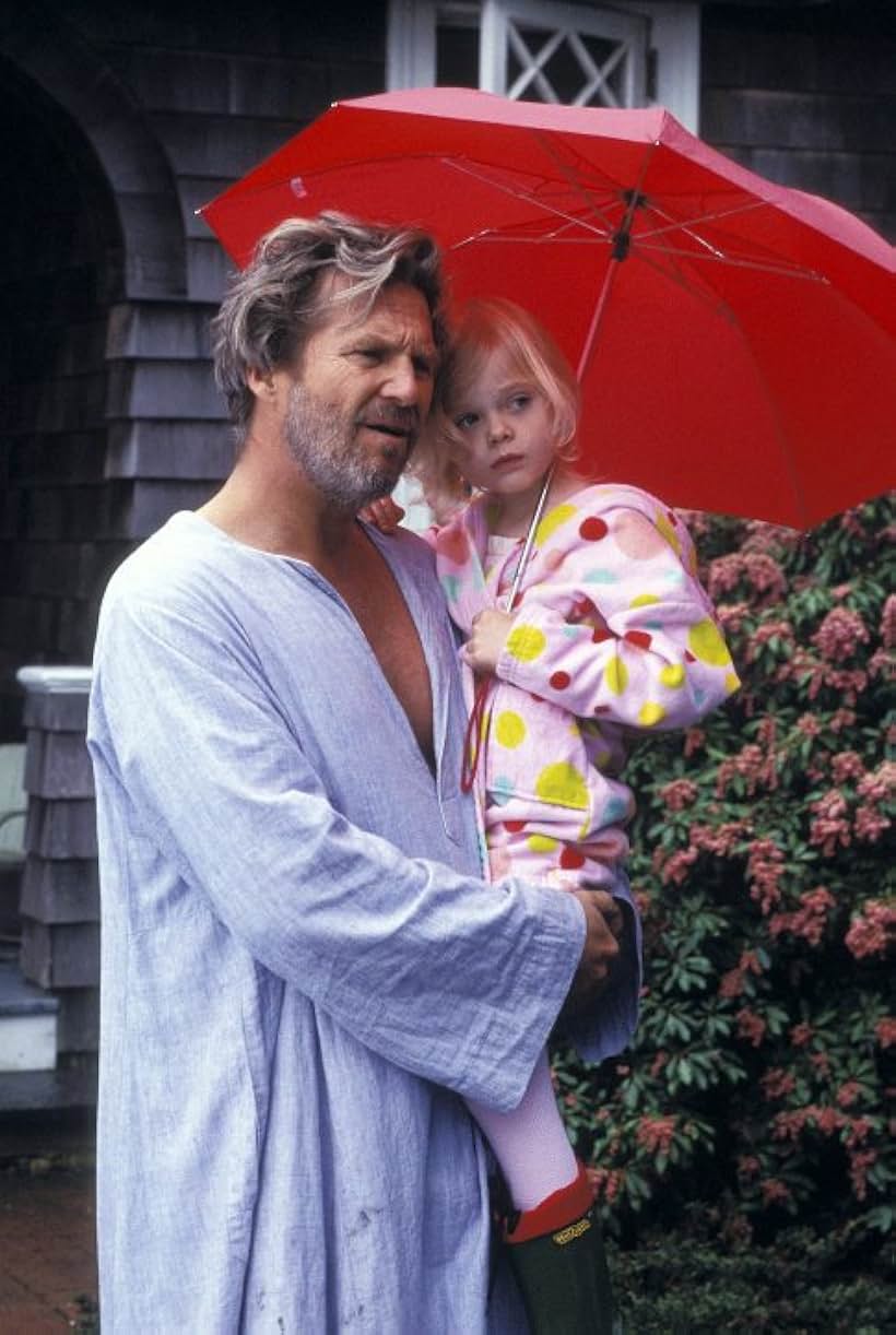 Jeff Bridges and Elle Fanning in The Door in the Floor (2004)