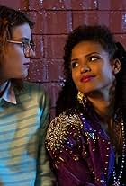 Gugu Mbatha-Raw and Mackenzie Davis in Gương Đen (2011)