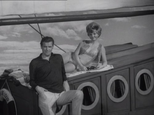 Roger Moore and Erica Rogers in The Saint (1962)