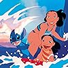 Tia Carrere, Daveigh Chase, and Chris Sanders in Lilo & Stitch (2002)