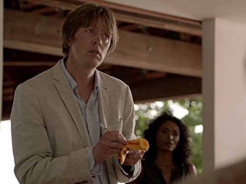 Kris Marshall and Sara Martins in Death in Paradise (2011)