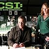 Marg Helgenberger and William Petersen in CSI: Crime Scene Investigation (2000)