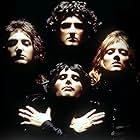 Roger Taylor, Brian May, Freddie Mercury, John Deacon, and Queen