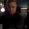 Marg Helgenberger and William Petersen in CSI: Crime Scene Investigation (2000)