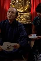 Leila Lee Olsen and James Hong in Chi of Steel (1995)