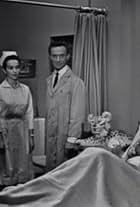 Norma Connolly, Jonathan Harris, Barbara Nichols, and Fredd Wayne in Miền Ảo Ảnh (1959)