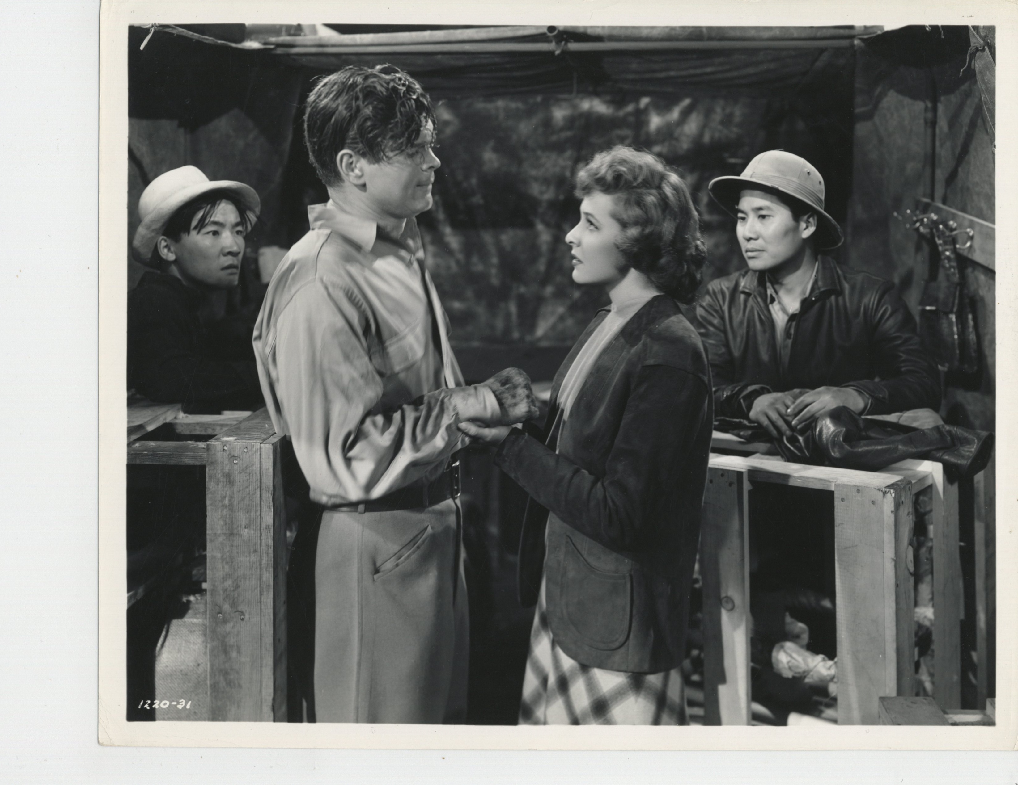 Laraine Day, Keye Luke, Barry Nelson, and Victor Sen Yung in A Yank on the Burma Road (1942)