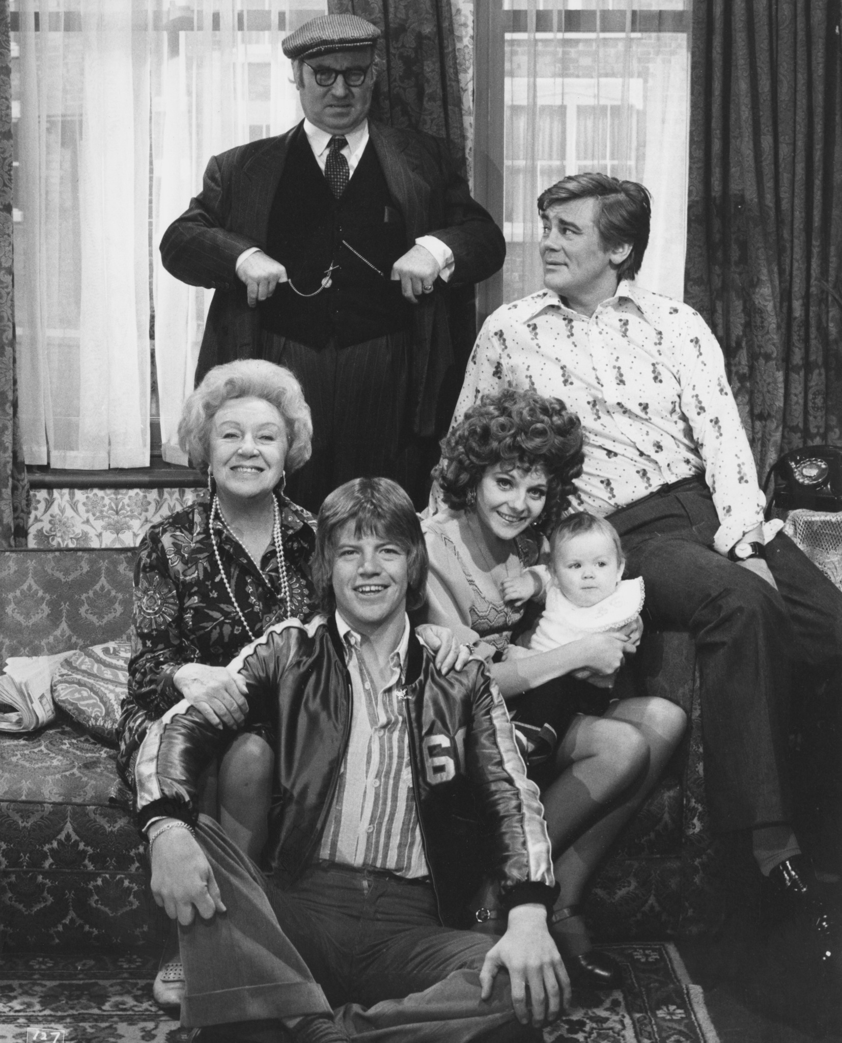 Robin Askwith, Anthony Booth, Doris Hare, Bill Maynard, and Sheila White