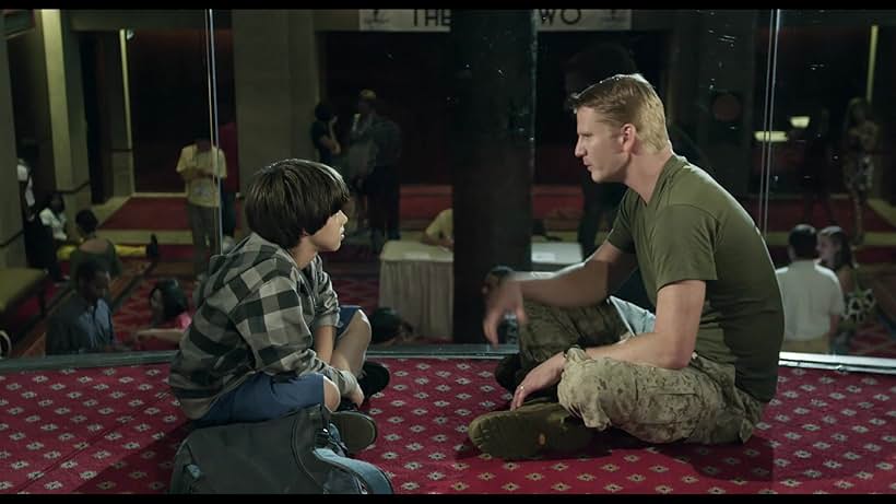 Dash Mihok and Uriah Shelton in Lifted (2010)