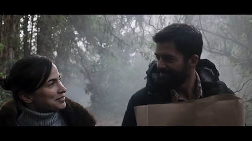 In their last attempt to save their marriage, Sara and Óscar decide to take a short vacation in a cabin in the woods with their two children. But upon arrival, strange events corrode the tense atmosphere between them: a woman prowls the house predicting events that defy nature, which break the family from within as they confront unresolved problems from their past.