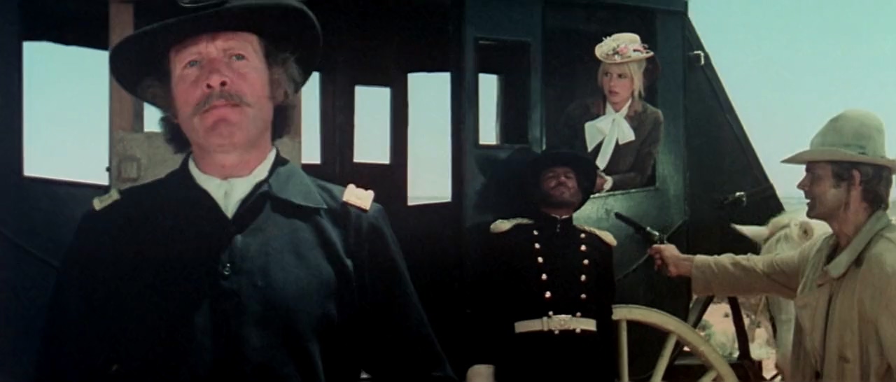 Terence Hill, Patrick McGoohan, Robert Charlebois, and Miou-Miou in Un genio, due compari, un pollo (1975)