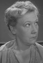 Claire Whitney in When Strangers Marry (1944)