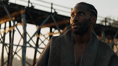 John David Washington must keep a robot kid alive in 'The Creator' (2023), a new sci-fi epic from Gareth Edwards, director of 'Rogue One: A Star Wars Story' (2016). Washington plays Joshua, an ex-special forces agent fighting a futuristic war between humans and artificial intelligence. After his wife disappears, Joshua is recruited to destroy the robots' secret weapon that could end the world, but instead he discovers their weapon is a cybernetic child named Alphie, played by newcomer Madeline Yuna Voyles. The Creator's creator, filmmaker Gareth Edwards reteams with Rogue One writer Chris Weitz and his Godzilla star Ken Watanabe for an original story that supposedly "makes 'Blade Runner' (1982) look like child's play," according to one journalist at the 2023 CinemaCon sneak peek. If you repli-can't believe the hype about Industrial Light & Magic's eye-popping visual effects, Edwards also enlists Allison Janney ('I, Tonya'), Gemma Chan ('Crazy Rich Asians'), and Ralph Ineson ('The Green Knight') in his future war that is slated for September 2023.