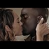 Amber Stevens West and Shamier Anderson in Love Jacked (2018)