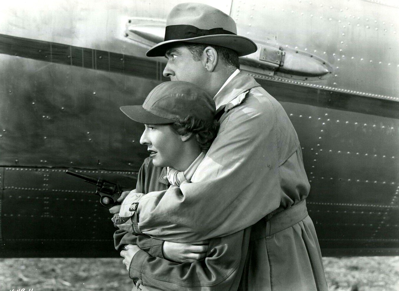 Mae Clarke and Grant Withers in Daredevils of the Clouds (1948)