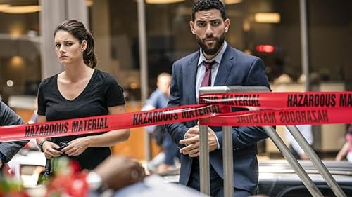 Missy Peregrym and Zeeko Zaki in FBI (2018)