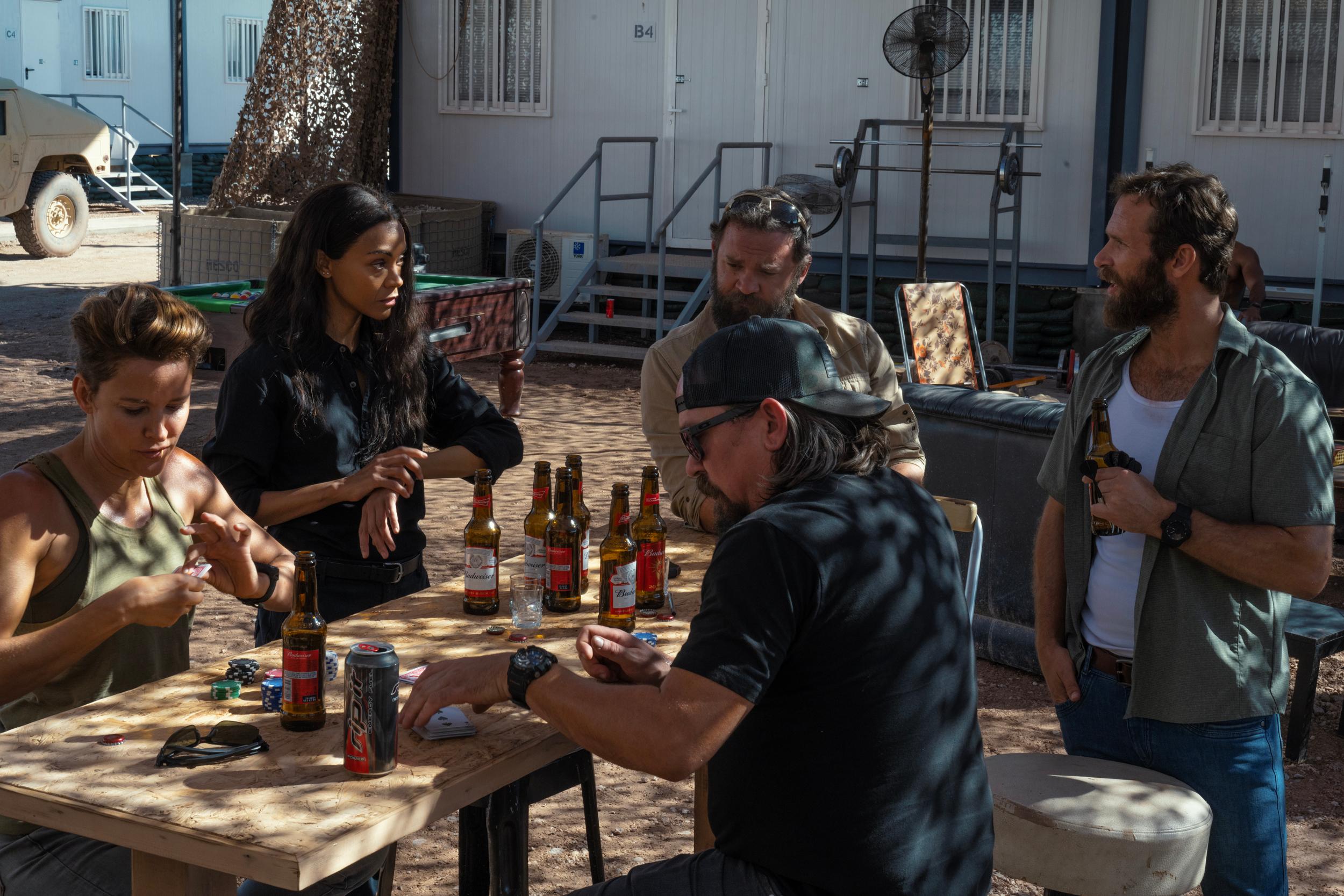 Zoe Saldana, Jill Wagner, James Jordan, Austin Hébert, and Jonah Wharton in Lioness (2023)