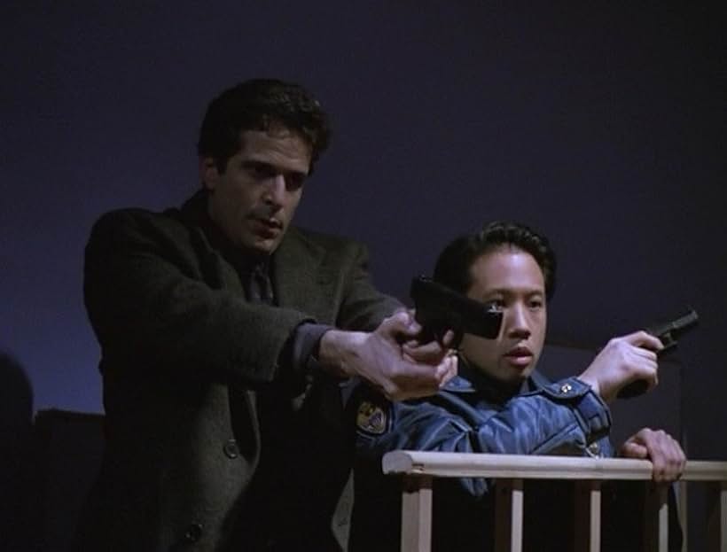 Russell Yuen and Stewart Bick in Someone Is Watching (2000)