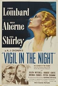 Brian Aherne and Carole Lombard in Vigil in the Night (1940)