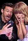 Ryan Seacrest and Taylor Swift at an event for IHeartRadio Music Awards (2015)