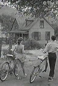 Carole Ann Campbell and Tommy Kirk in The Hardy Boys: The Mystery of the Ghost Farm (1957)