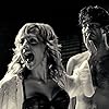 Brittany Murphy and Clive Owen in Sin City (2005)