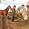 Emily Watson, Peter Mullan, and Jeremy Irvine in War Horse (2011)