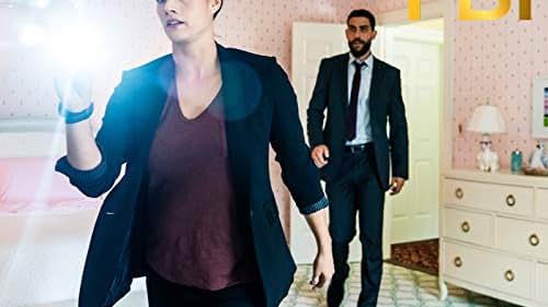 Missy Peregrym and Zeeko Zaki in FBI (2018)