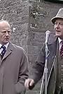 Michael Sheard and Robert Urquhart in An Enemy of the People (1980)